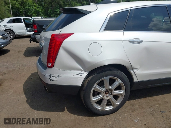 2014 Cadillac SRX Performance Collection with VIN 3GYFNFE34ES677712, listed as a IAAI auction lot 42668059 with 150,135 mi miles and . Bid and sale history available at DreamBid. Image 6.