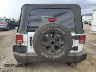 2012 Jeep Wrangler Unlimited Sport z VIN 1C4BJWDG9CL169159, wystawiony jako Copart lot #83647894 z przebiegiem 120 684 mil mil oraz Szkoda całkowita • Salvage title. Historia ofert i sprzedaży dostępna na DreamBid. Obrazek 6.
