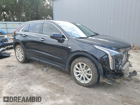 2020 Cadillac XT4 FWD Luxury with VIN 1GYAZAR47LF142704, listed as a Copart auction lot 86730714 with 122,356 mi miles and Salvage Title. Bid and sale history available at DreamBid. Image 4.