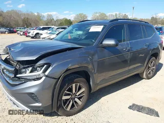 2021 Volkswagen Atlas SE z VIN 1V2DP2CA3MC518670, wystawiony jako IAAI lot #41860811 z przebiegiem 69 270 mil mil oraz . Historia ofert i sprzedaży dostępna na DreamBid. Obrazek 2.