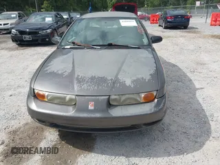 2000 Saturn SL z VIN 1G8ZK527XYZ121984, wystawiony jako IAAI lot #42099839 z przebiegiem 174 210 mil mil oraz . Historia ofert i sprzedaży dostępna na DreamBid. Obrazek 6.