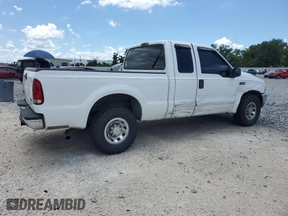2003 Ford F-250 XL with VIN 1FTNX20L63EB37975, listed as a Copart auction lot 65723935 with 157,377 mi miles and Salvage title. Bid and sale history available at DreamBid. Image 3.