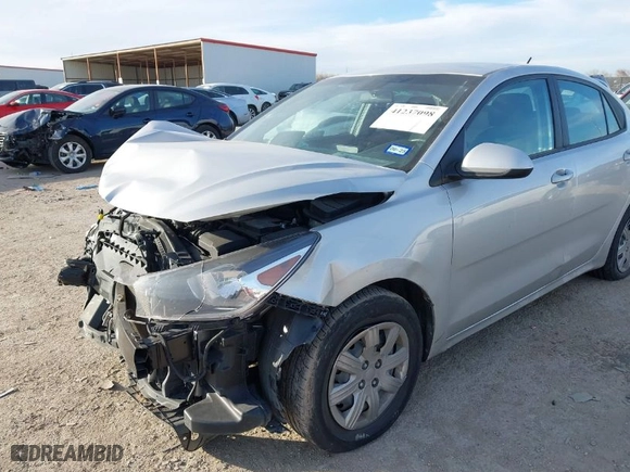 2023 Kia Rio S with VIN 3KPA24AD2PE573121, listed as a IAAI auction lot 41237098 with NaN miles. Bid and sale history available at carsss.com. Image 6.