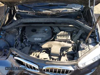 2017 BMW X1 sDrive28i with VIN WBXHU7C30H5H32753, listed as a IAAI auction lot 41441791 with 100,072 mi miles. Bid and sale history available at carsss.com. Image 10.