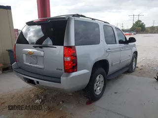 2012 Chevrolet Tahoe LT z VIN 1GNSCBE03CR144606, wystawiony jako IAAI lot #42005433 z przebiegiem 193 386 mil mil oraz . Historia ofert i sprzedaży dostępna na DreamBid. Obrazek 4.