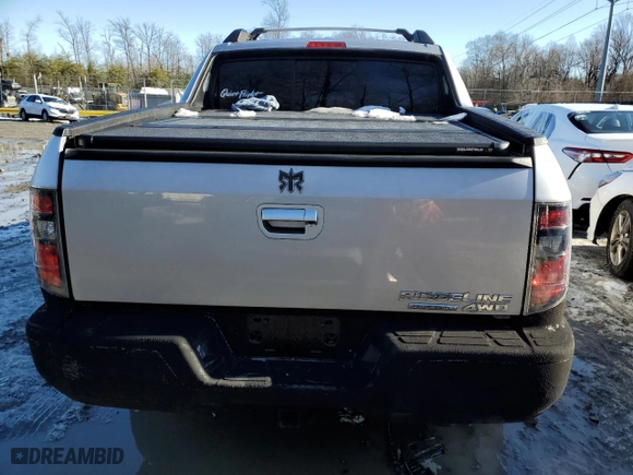 2014 Honda Ridgeline SE with VIN 5FPYK1F63EB014506, listed as a Copart auction lot 41698255 with 100,828 mi miles and Salvage Title. Bid and sale history available at carsss.com. Image 6.