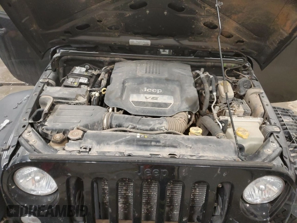 2017 Jeep Wrangler Willys Wheeler with VIN 1C4AJWAG9HL696710, listed as a Copart auction lot 88744905 with 66,800 mi miles and Salvage Title. Bid and sale history available at DreamBid. Image 12.
