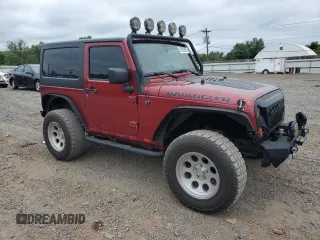 2012 Jeep Wrangler Sport z VIN 1C4AJWAG7CL105511, wystawiony jako Copart lot #62822985 z przebiegiem 137 520 mil mil oraz Czysty tytuł • Clean title. Historia ofert i sprzedaży dostępna na DreamBid. Obrazek 4.