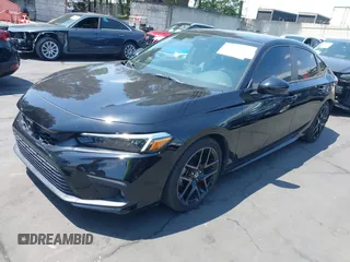 2023 Honda Civic Sport Touring z VIN 19XFL1H80PE009154, wystawiony jako IAAI lot #42170202 z przebiegiem 17 291 mil mil oraz . Historia ofert i sprzedaży dostępna na DreamBid. Obrazek 18.