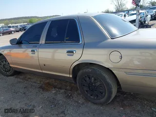 2004 Mercury Grand Marquis GS with VIN 2MEFM74W94X674014, listed as a IAAI auction lot 41973693 with 163,865 mi miles. Bid and sale history available at carsss.com. Image 13.