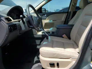 2008 Mercury Sable Premier z VIN 1MEHM42W38G607432, wystawiony jako Copart lot #54022165 z przebiegiem 118 959 mil mil oraz Szkody całkowita. Historia ofert i sprzedaży dostępna na DreamBid. Obrazek 7.