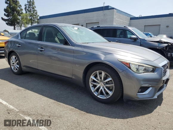 2018 Infiniti Q50 Luxe with VIN JN1EV7AP6JM364691, listed as a Copart auction lot 61680685 with 103,370 mi miles and Salvage title. Bid and sale history available at DreamBid. Image 4.