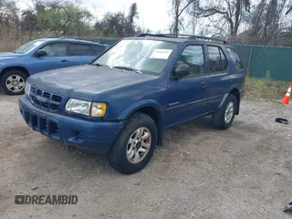 2002 Isuzu Rodeo S with VIN 4S2CK58W124320988, listed as a IAAI auction lot 41921874 with 227,320 mi miles and . Bid and sale history available at DreamBid. Image 2.