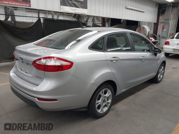 2015 Ford Fiesta SE with VIN 3FADP4BJXFM133631, listed as a IAAI auction lot 41835888 with 51,562 mi miles. Bid and sale history available at carsss.com. Image 4.