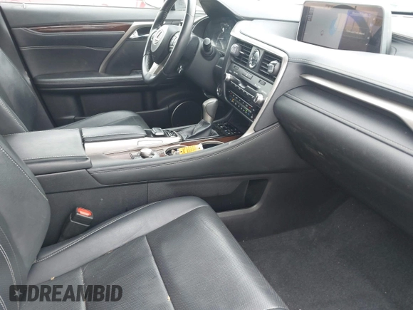 2016 Lexus RX 350 z VIN 2T2BZMCAXGC014817, wystawiony jako IAAI lot #42077588 z przebiegiem 91 035 mil mil oraz . Historia ofert i sprzedaży dostępna na DreamBid. Obrazek 5.
