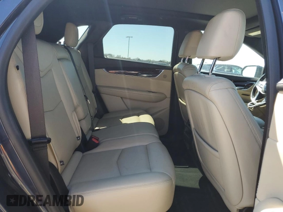 2019 Cadillac XT5 Luxury FWD with VIN 1GYKNCRS1KZ131818, listed as a Copart auction lot 49354595 with 131,995 mi miles and Salvage Title. Bid and sale history available at DreamBid. Image 10.