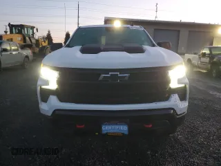 2023 Chevrolet Silverado 1500 LT Trail Boss with VIN 3GCUDFE88PG190420, listed as a Copart auction lot 87728935 with 54,396 mi miles and Salvage Title. Bid and sale history available at DreamBid. Image 5.