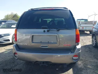 2005 GMC Envoy SLE with VIN 1GKDS13S452306939, listed as a IAAI auction lot 41931667 with 236,955 mi miles. Bid and sale history available at carsss.com. Image 17.