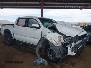 2023 Toyota Tacoma SR with VIN 3TMCZ5AN2PM536191, listed as a IAAI auction lot 42349794 with 54,552 mi miles and . Bid and sale history available at DreamBid. Image 1.