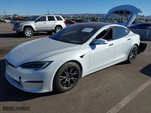 2022 Tesla Model S Plaid with VIN 5YJSA1E64NF479959, listed as a IAAI auction lot 41057673 with 27,203 mi miles. Bid and sale history available at carsss.com. Image 2.