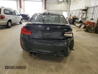 2018 BMW M2 z VIN WBS1J5C51J7B70216, wystawiony jako Copart lot #54983755 z przebiegiem 80 398 mil mil oraz Tytuł czysty. Historia ofert i sprzedaży dostępna na DreamBid. Obrazek 6.