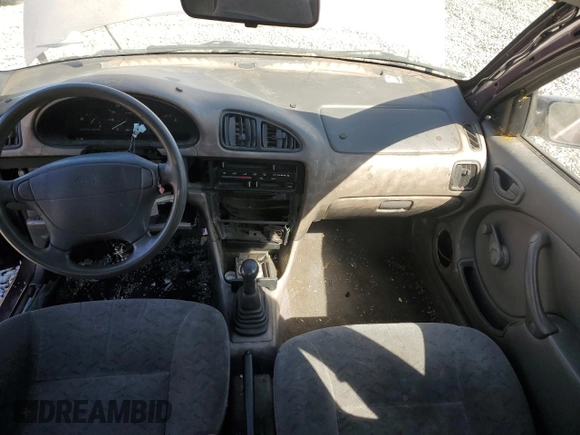 1996 Geo Metro z VIN 2C1MR2296T6778911, wystawiony jako Copart lot #50937725 z przebiegiem 157 821 mil mil oraz Szkoda całkowita • Salvage title. Historia ofert i sprzedaży dostępna na DreamBid. Obrazek 8.