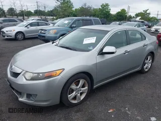 2009 Acura TSX z VIN JH4CU26609C002270, wystawiony jako IAAI lot #42347173 z przebiegiem 169 249 mil mil oraz . Historia ofert i sprzedaży dostępna na DreamBid. Obrazek 2.