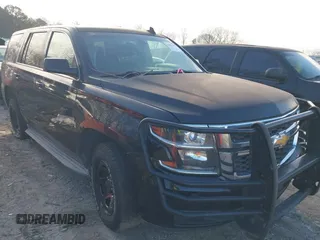 2015 Chevrolet Tahoe Commercial z VIN 1GNLC2EC4FR535329, wystawiony jako IAAI lot #41643486 z przebiegiem 185 326 mil mil oraz . Historia ofert i sprzedaży dostępna na DreamBid. Obrazek 1.