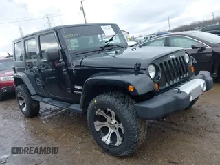 2008 Jeep Wrangler Unlimited Sahara with VIN 1J4GA59128L596561, listed as a IAAI auction lot 41512887 with 166,784 mi miles and . Bid and sale history available at carsss.com. Image 1.