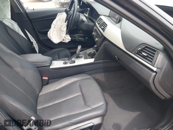 2014 BMW 3 Series 320i xDrive with VIN WBA3C3C59EF984070, listed as a IAAI auction lot 42063569 with 169,002 mi miles and . Bid and sale history available at DreamBid. Image 5.