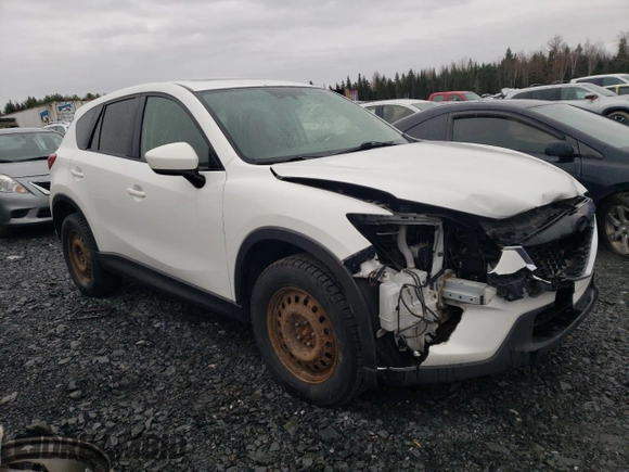 2014 Mazda CX-5 Touring z VIN JM3KE4CY1E0406726, wystawiony jako Copart lot #54652065 z przebiegiem 245 491 mil mil oraz Szkoda całkowita • Salvage title. Historia ofert i sprzedaży dostępna na DreamBid. Obrazek 4.
