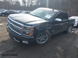 2015 Chevrolet Silverado 1500 High Country with VIN 3GCUKTEC3FG506216, listed as a IAAI auction lot 41672433 with 77,653 mi miles. Bid and sale history available at carsss.com. Image 2.
