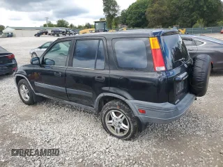1997 Honda CR-V with VIN JHLRD185XVC069529, listed as a Copart auction lot 73660154 with 250,671 mi miles and Salvage Title. Bid and sale history available at carsss.com. Image 2.