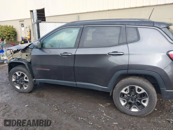 2017 Jeep Compass Trailhawk with VIN 3C4NJDDB9HT657173, listed as a IAAI auction lot 41613348 with 60,781 mi miles and . Bid and sale history available at DreamBid. Image 15.