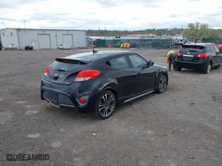 2016 Hyundai Veloster Turbo with VIN KMHTC6AE1GU264151, listed as a IAAI auction lot 42054383 with 92,378 mi miles. Bid and sale history available at carsss.com. Image 4.