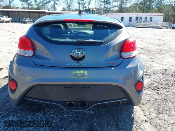 2015 Hyundai Veloster Turbo with VIN KMHTC6AE8FU229198, listed as a IAAI auction lot 41596345 with 74,943 mi miles. Bid and sale history available at carsss.com. Image 16.