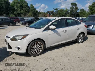 2014 Ford Focus Titanium with VIN 1FADP3J28EL179267, listed as a Copart auction lot 65359335 with 163,835 mi miles and Clean title. Bid and sale history available at DreamBid. Image 1.