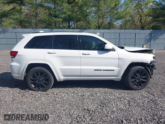 2018 Jeep Grand Cherokee Altitude with VIN 1C4RJFAG4JC309523, listed as a IAAI auction lot 42159534 with 86,682 mi miles and . Bid and sale history available at DreamBid. Image 13.