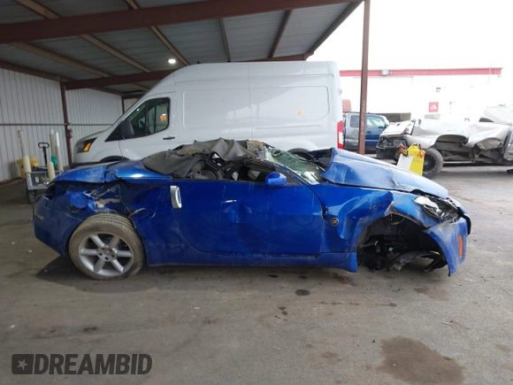 2005 Nissan 350Z Touring with VIN JN1AZ36A45M753058, listed as a IAAI auction lot 41563023 with 1 mi miles. Bid and sale history available at carsss.com. Image 13.