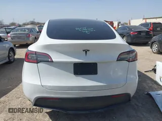 2024 Tesla Model Y with VIN 7SAYGDEDXRA300743, listed as a IAAI auction lot 41690374 with 12,446 mi miles and . Bid and sale history available at DreamBid. Image 17.