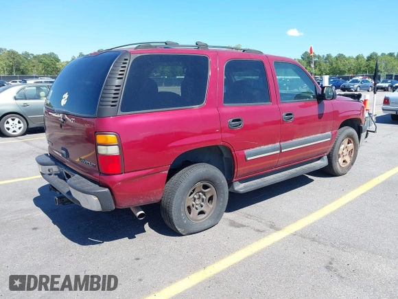 2004 Chevrolet Tahoe LS with VIN 1GNEC13Z74R207698, listed as a IAAI auction lot 42310462 with 255,218 mi miles and . Bid and sale history available at DreamBid. Image 4.