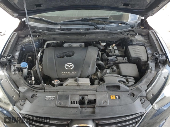 2016 Mazda CX-5 Touring with VIN JM3KE2CY9G0834048, listed as a Copart auction lot 54491535 with 116,328 mi miles and Salvage Title. Bid and sale history available at DreamBid. Image 12.