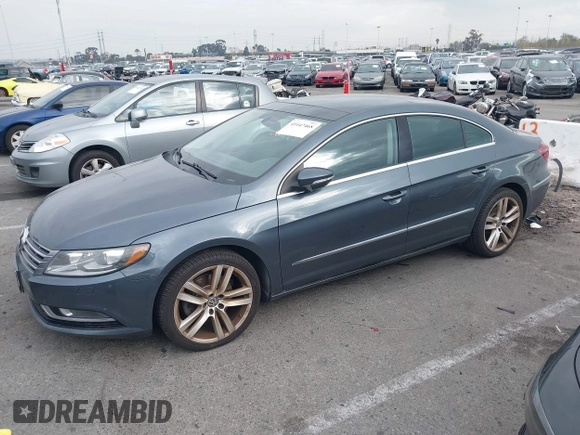 2013 Volkswagen CC Lux with VIN WVWRP7AN8DE507811, listed as a IAAI auction lot 41447468 with 147,162 mi miles. Bid and sale history available at carsss.com. Image 2.
