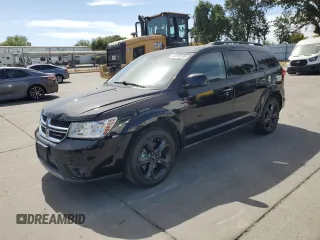 2015 Dodge Journey SXT with VIN 3C4PDCBG6FT743028, listed as a Copart auction lot 63286595 with 148,595 mi miles and Salvage title. Bid and sale history available at DreamBid. Image 1.