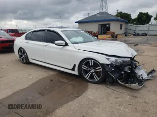 2016 BMW 7 Series 740i with VIN WBA7E2C53GG739056, listed as a Copart auction lot 59141613 with 0 mi miles. Bid and sale history available at carsss.com. Image 4.