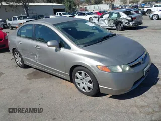 2006 Honda Civic LX z VIN 1HGFA165X6L040157, wystawiony jako IAAI lot #41711312 z przebiegiem 168 780 mil mil oraz . Historia ofert i sprzedaży dostępna na DreamBid. Obrazek 1.