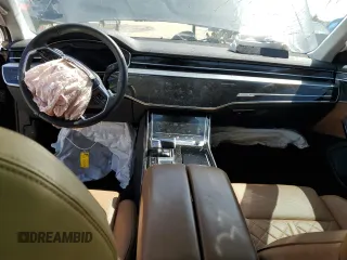 2020 Audi S8 z VIN WAU8SAF81LN014302, wystawiony jako Copart lot #48910773 z przebiegiem Nie podano mil oraz . Historia ofert i sprzedaży dostępna na DreamBid. Obrazek 8.
