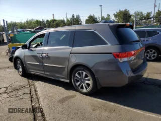 2016 Honda Odyssey Touring Elite with VIN 5FNRL5H91GB092214, listed as a Copart auction lot 61158745 with 121,477 mi miles and Salvage title. Bid and sale history available at DreamBid. Image 2.