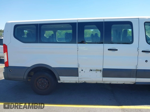 2015 Ford Transit XL z VIN 1FBZX2ZM5FKA37860, wystawiony jako IAAI lot #42059536 z przebiegiem 146 928 mil mil oraz . Historia ofert i sprzedaży dostępna na DreamBid. Obrazek 19.