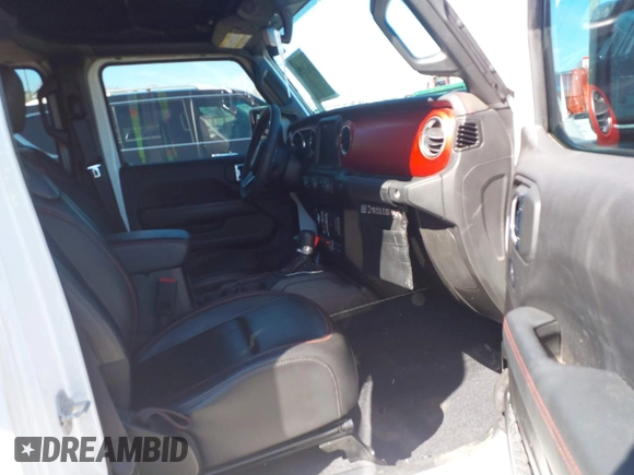 2023 Jeep Wrangler Rubicon with VIN 1C4HJXFG8PW655138, listed as a IAAI auction lot 41674959 with 40,790 mi miles and . Bid and sale history available at DreamBid. Image 5.